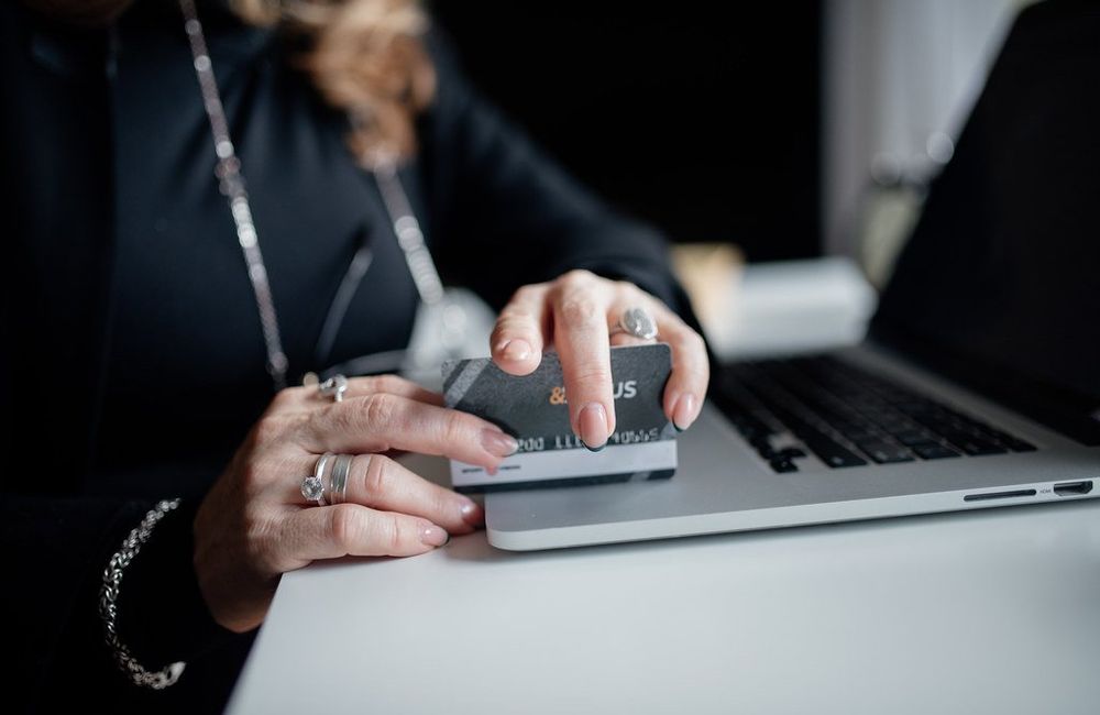 A person reviewing messages on a tablet