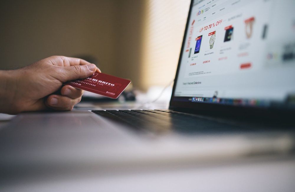 A card payment being made on a laptop